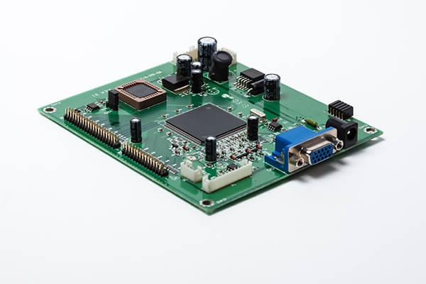 Embedded System - green VGA monitor circuit board with multiple electronic components installed